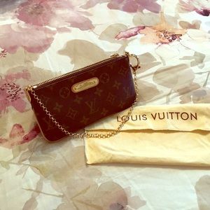 Louis Vuitton clutch!